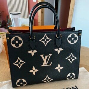 Nice offer✨💎Louis Vuitton Black and White ONTHEGO MM Bag